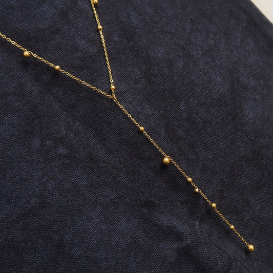 Tassel Twirl — Y-shaped Necklace with Tassel Pendant & Round Beads