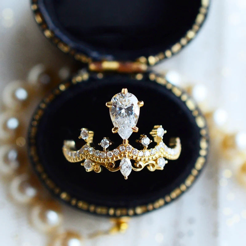 Crown Jewel — Vintage Crown Design Pear Cut Engagement Ring