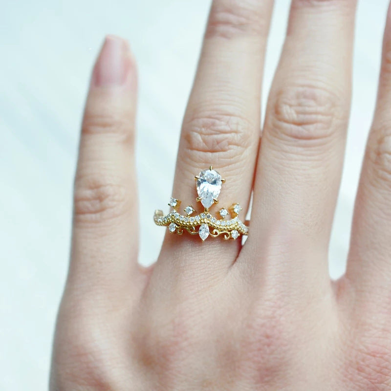 Crown Jewel — Vintage Crown Design Pear Cut Engagement Ring