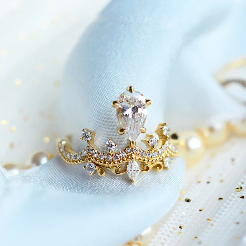 Crown Jewel — Vintage Crown Design Pear Cut Engagement Ring