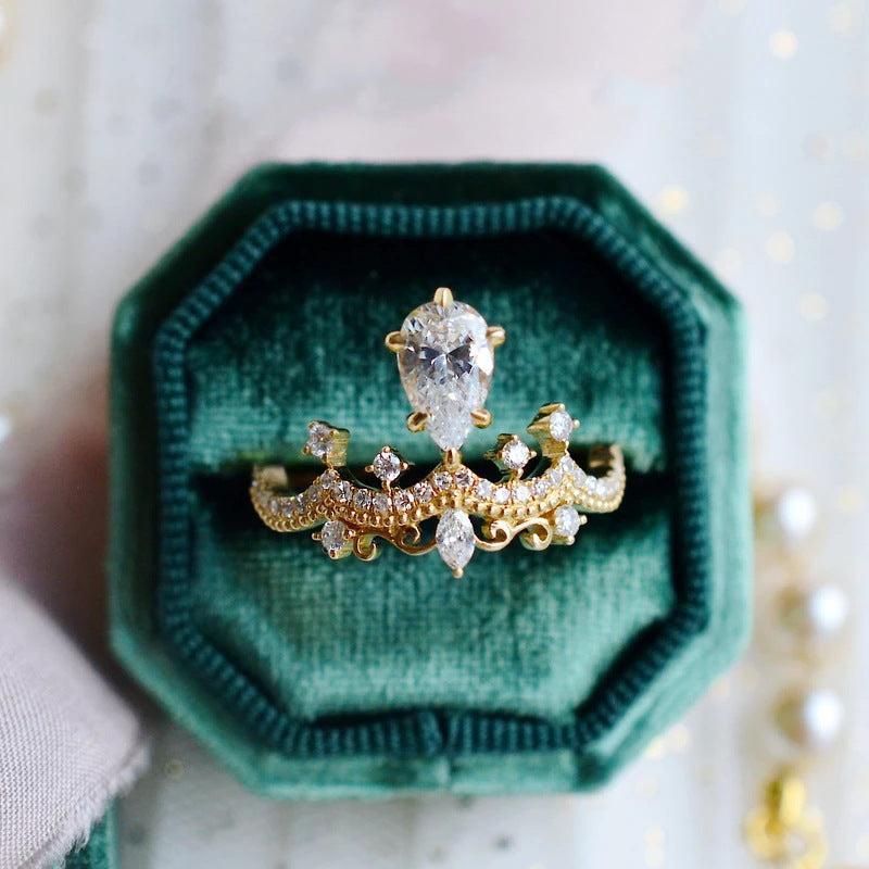 Crown Jewel — Vintage Crown Design Pear Cut Engagement Ring