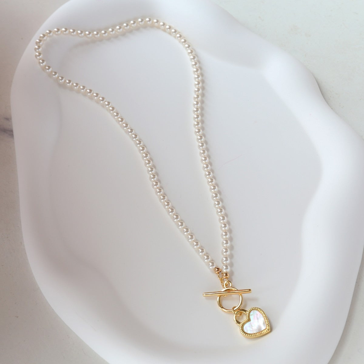 Two Hearts — Reversible Black & White Heart Necklace